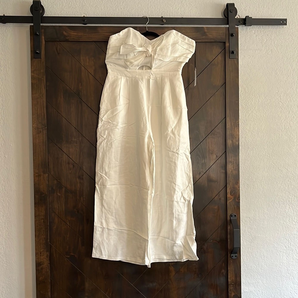 ASTR strapless white romper. Long pant leg